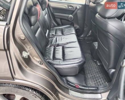 Серый Хонда СРВ, объемом двигателя 2.35 л и пробегом 250 тыс. км за 14000 $, фото 7 на Automoto.ua