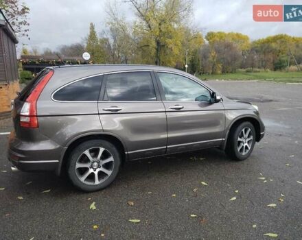 Серый Хонда СРВ, объемом двигателя 2.35 л и пробегом 250 тыс. км за 14000 $, фото 2 на Automoto.ua