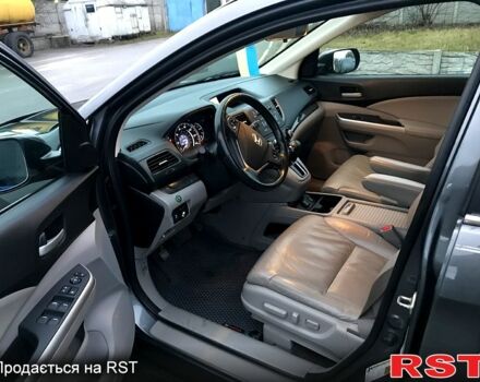 Серый Хонда СРВ, объемом двигателя 2.4 л и пробегом 135 тыс. км за 14000 $, фото 5 на Automoto.ua