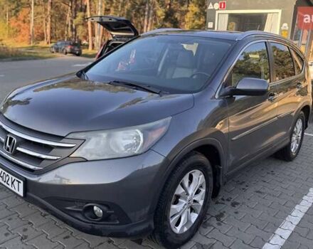 Серый Хонда СРВ, объемом двигателя 2.35 л и пробегом 253 тыс. км за 14000 $, фото 1 на Automoto.ua