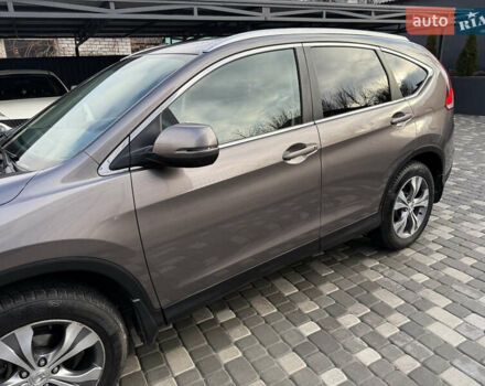 Серый Хонда СРВ, объемом двигателя 2.35 л и пробегом 128 тыс. км за 16500 $, фото 2 на Automoto.ua