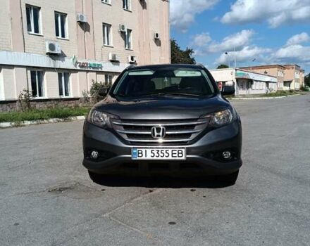 Серый Хонда СРВ, объемом двигателя 2.35 л и пробегом 220 тыс. км за 15500 $, фото 1 на Automoto.ua