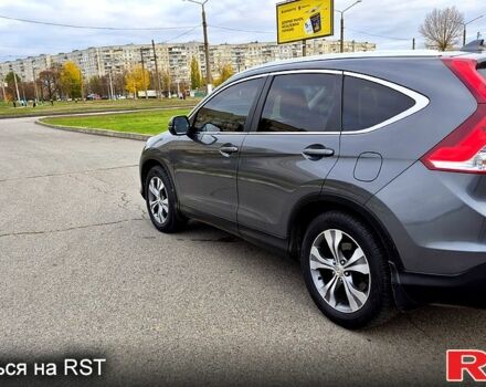 Серый Хонда СРВ, объемом двигателя 2.4 л и пробегом 170 тыс. км за 15500 $, фото 2 на Automoto.ua