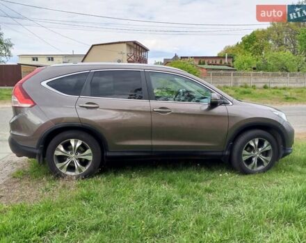 Серый Хонда СРВ, объемом двигателя 2.4 л и пробегом 195 тыс. км за 13900 $, фото 1 на Automoto.ua