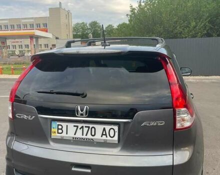 Серый Хонда СРВ, объемом двигателя 2.35 л и пробегом 240 тыс. км за 15000 $, фото 1 на Automoto.ua