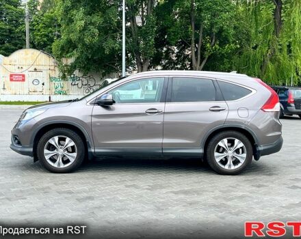 Хонда СРВ 2014 в Львове на Automoto.ua Серый Хонда СРВ, объемом двигателя 2.2 л и пробегом 185 тыс. км за 16950 $, фото 3 на Automoto.ua