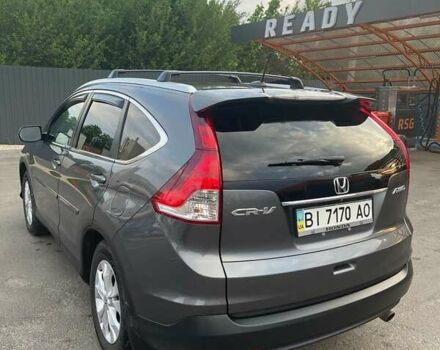 Серый Хонда СРВ, объемом двигателя 2.35 л и пробегом 240 тыс. км за 15000 $, фото 3 на Automoto.ua