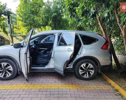 Сірий Хонда СРВ, об'ємом двигуна 2.36 л та пробігом 104 тис. км за 14000 $, фото 2 на Automoto.ua