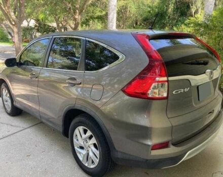 Серый Хонда СРВ, объемом двигателя 2.4 л и пробегом 64 тыс. км за 4500 $, фото 1 на Automoto.ua