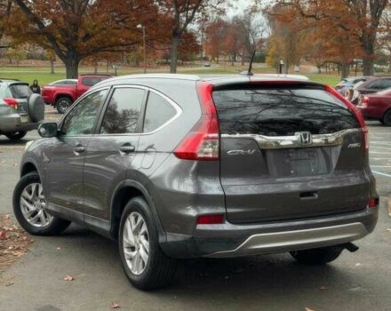 Серый Хонда СРВ, объемом двигателя 2.4 л и пробегом 77 тыс. км за 9000 $, фото 4 на Automoto.ua