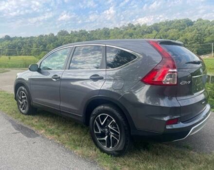 Серый Хонда СРВ, объемом двигателя 2.4 л и пробегом 73 тыс. км за 7100 $, фото 4 на Automoto.ua