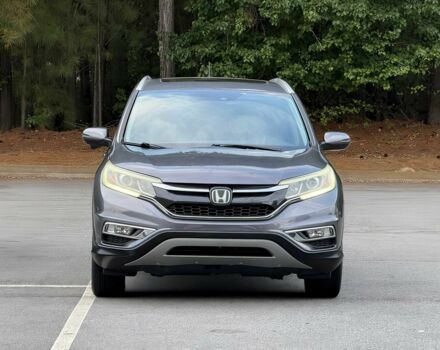 Серый Хонда СРВ, объемом двигателя 2.4 л и пробегом 77 тыс. км за 10000 $, фото 1 на Automoto.ua