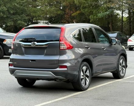 Серый Хонда СРВ, объемом двигателя 2.4 л и пробегом 77 тыс. км за 10000 $, фото 2 на Automoto.ua