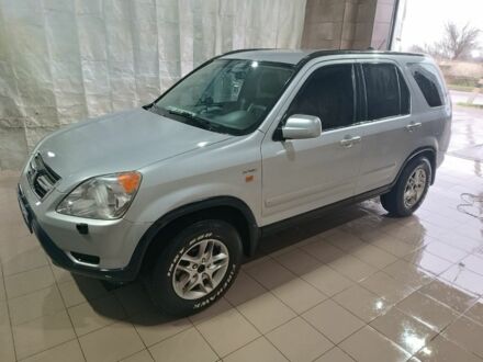 Серый Хонда СРВ, объемом двигателя 2 л и пробегом 215 тыс. км за 4500 $, фото 1 на Automoto.ua