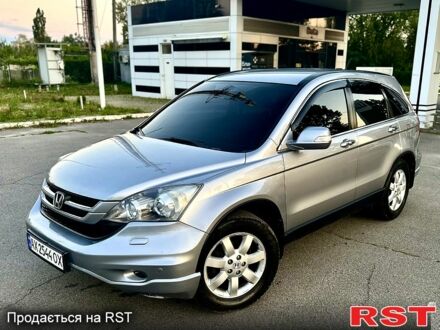 Серый Хонда СРВ, объемом двигателя 2 л и пробегом 150 тыс. км за 10000 $, фото 1 на Automoto.ua