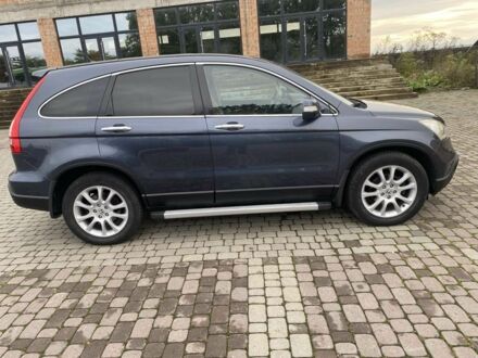 Серый Хонда СРВ, объемом двигателя 2.2 л и пробегом 235 тыс. км за 9500 $, фото 1 на Automoto.ua