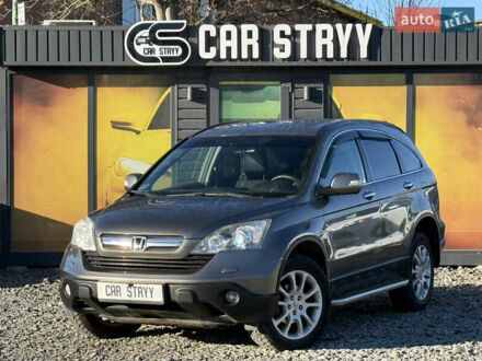 Серый Хонда СРВ, объемом двигателя 2.4 л и пробегом 214 тыс. км за 9500 $, фото 1 на Automoto.ua