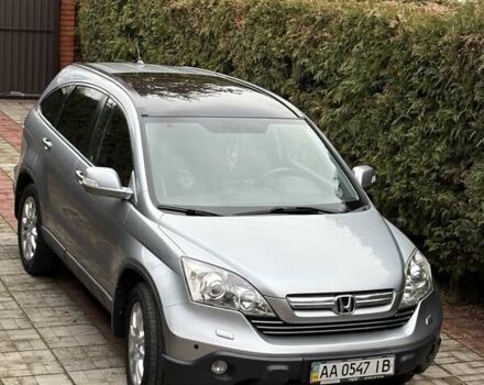 Серый Хонда СРВ, объемом двигателя 2.4 л и пробегом 220 тыс. км за 10700 $, фото 1 на Automoto.ua