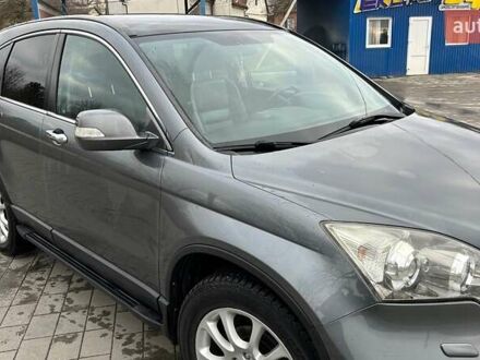 Серый Хонда СРВ, объемом двигателя 2.4 л и пробегом 225 тыс. км за 10900 $, фото 1 на Automoto.ua