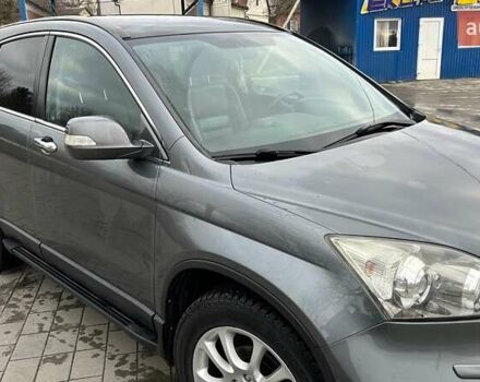 Серый Хонда СРВ, объемом двигателя 2.4 л и пробегом 225 тыс. км за 10900 $, фото 1 на Automoto.ua