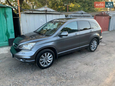 Серый Хонда СРВ, объемом двигателя 2.4 л и пробегом 205 тыс. км за 14000 $, фото 1 на Automoto.ua