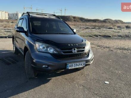 Серый Хонда СРВ, объемом двигателя 2.4 л и пробегом 170 тыс. км за 10900 $, фото 1 на Automoto.ua