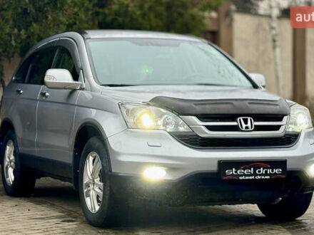 Серый Хонда СРВ, объемом двигателя 2 л и пробегом 175 тыс. км за 12299 $, фото 1 на Automoto.ua