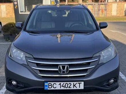 Серый Хонда СРВ, объемом двигателя 2.35 л и пробегом 253 тыс. км за 14000 $, фото 1 на Automoto.ua