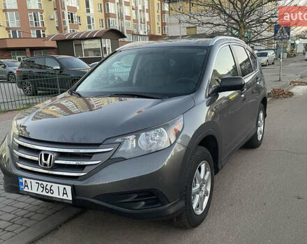 Серый Хонда СРВ, объемом двигателя 2.35 л и пробегом 162 тыс. км за 15300 $, фото 1 на Automoto.ua