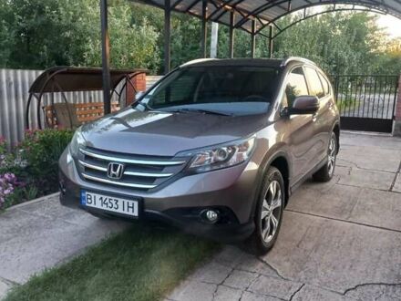 Серый Хонда СРВ, объемом двигателя 2.35 л и пробегом 181 тыс. км за 16500 $, фото 1 на Automoto.ua