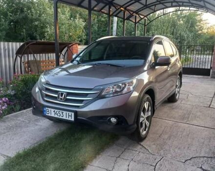 Серый Хонда СРВ, объемом двигателя 2.35 л и пробегом 181 тыс. км за 16500 $, фото 1 на Automoto.ua