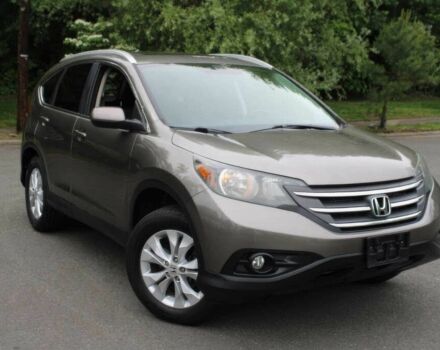 Серый Хонда СРВ, объемом двигателя 2.4 л и пробегом 83 тыс. км за 7000 $, фото 1 на Automoto.ua