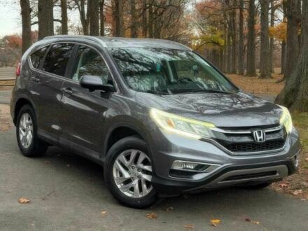 Серый Хонда СРВ, объемом двигателя 2.4 л и пробегом 74 тыс. км за 10700 $, фото 1 на Automoto.ua