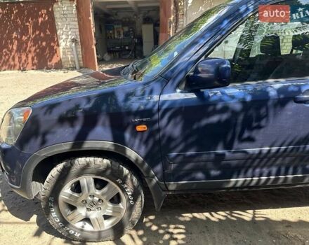 Синий Хонда СРВ, объемом двигателя 2 л и пробегом 337 тыс. км за 7000 $, фото 4 на Automoto.ua