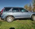 Синий Хонда СРВ, объемом двигателя 2 л и пробегом 244 тыс. км за 6400 $, фото 1 на Automoto.ua