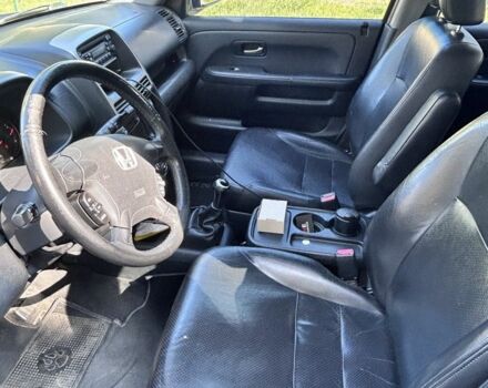 Синий Хонда СРВ, объемом двигателя 2 л и пробегом 203 тыс. км за 6500 $, фото 6 на Automoto.ua