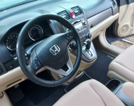 Синий Хонда СРВ, объемом двигателя 2.35 л и пробегом 214 тыс. км за 9800 $, фото 1 на Automoto.ua