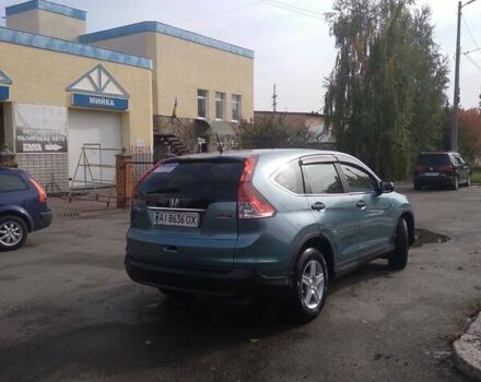 Синий Хонда СРВ, объемом двигателя 2.35 л и пробегом 360 тыс. км за 11500 $, фото 1 на Automoto.ua