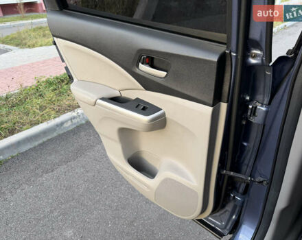 Синий Хонда СРВ, объемом двигателя 2.4 л и пробегом 250 тыс. км за 12777 $, фото 70 на Automoto.ua