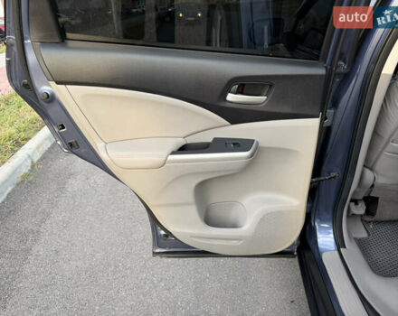 Синий Хонда СРВ, объемом двигателя 2.4 л и пробегом 250 тыс. км за 12777 $, фото 61 на Automoto.ua