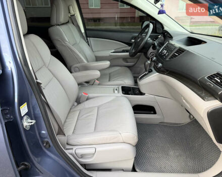 Синий Хонда СРВ, объемом двигателя 2.4 л и пробегом 250 тыс. км за 12777 $, фото 91 на Automoto.ua