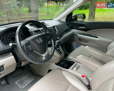 Хонда СРВ 2014 в Киеве на Automoto.ua Синий Хонда СРВ, объемом двигателя 2.4 л и пробегом 143 тыс. км за 16490 $, фото 18 на Automoto.ua