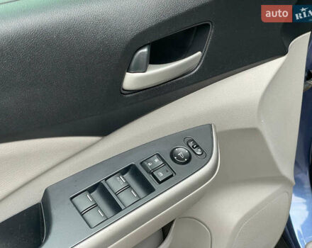 Хонда СРВ 2014 в Киеве на Automoto.ua Синий Хонда СРВ, объемом двигателя 2.4 л и пробегом 143 тыс. км за 16490 $, фото 23 на Automoto.ua