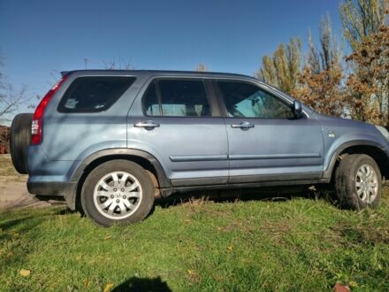 Синий Хонда СРВ, объемом двигателя 2 л и пробегом 244 тыс. км за 6400 $, фото 1 на Automoto.ua