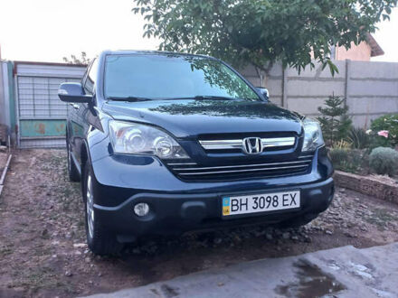 Синий Хонда СРВ, объемом двигателя 2.35 л и пробегом 214 тыс. км за 9800 $, фото 1 на Automoto.ua