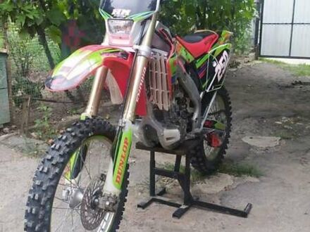 Хонда CRF 250R 2013 у Мурованых Куриловцах на Automoto.ua Зелений Хонда CRF 250R, об'ємом двигуна 0.25 л та пробігом 100 тис. км за 4000 $, фото 1 на Automoto.ua