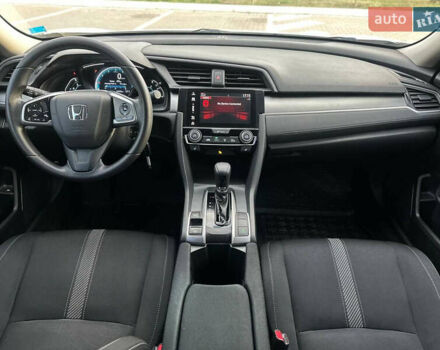 Белый Хонда Цивик, объемом двигателя 2 л и пробегом 153 тыс. км за 12950 $, фото 26 на Automoto.ua