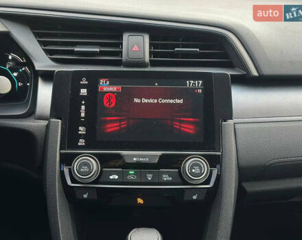 Белый Хонда Цивик, объемом двигателя 2 л и пробегом 153 тыс. км за 12950 $, фото 24 на Automoto.ua