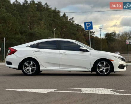 Белый Хонда Цивик, объемом двигателя 2 л и пробегом 153 тыс. км за 12950 $, фото 13 на Automoto.ua