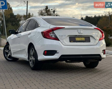 Белый Хонда Цивик, объемом двигателя 2 л и пробегом 153 тыс. км за 12950 $, фото 19 на Automoto.ua